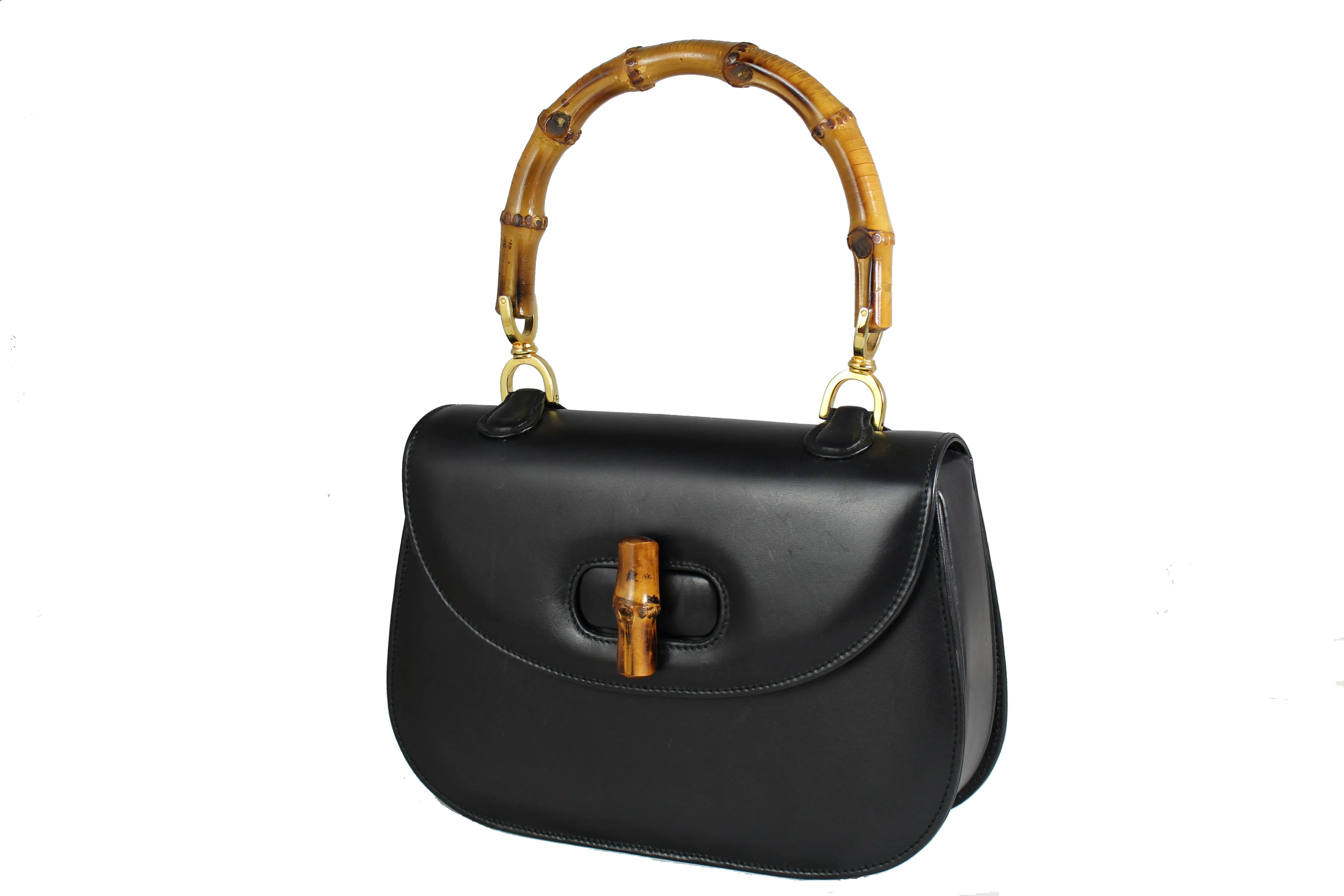 Black leather handbag with bamboo handle and lock